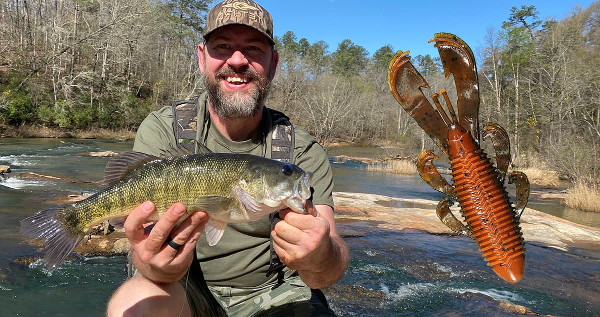 The author with a nice shoal bass and his favorite bait for catching them.