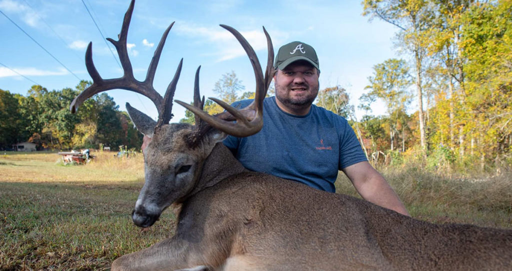 David Payne with a giant North Georgia buck taken by muzzleloader.