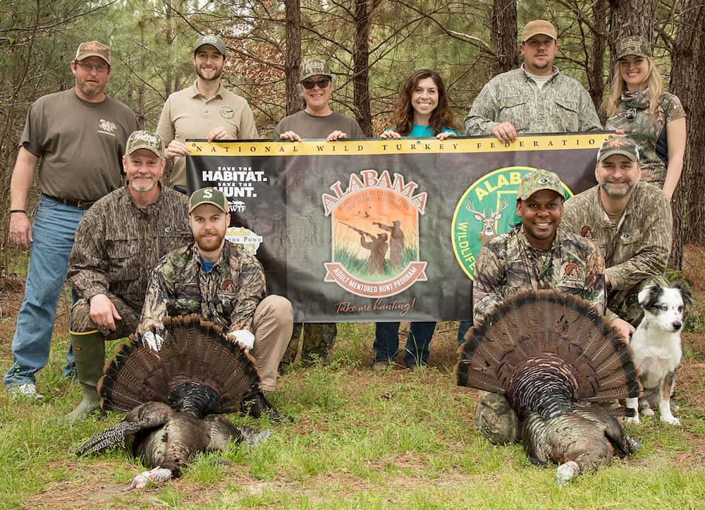 Group photo from an Alabama mentored turkey hunt.