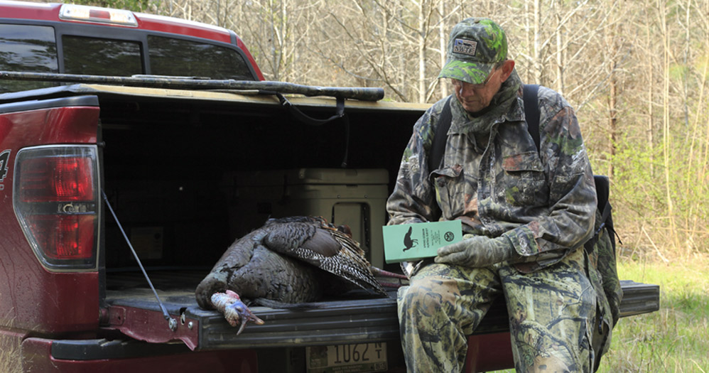 A Mississippi hunter checking in his turkey harvest.