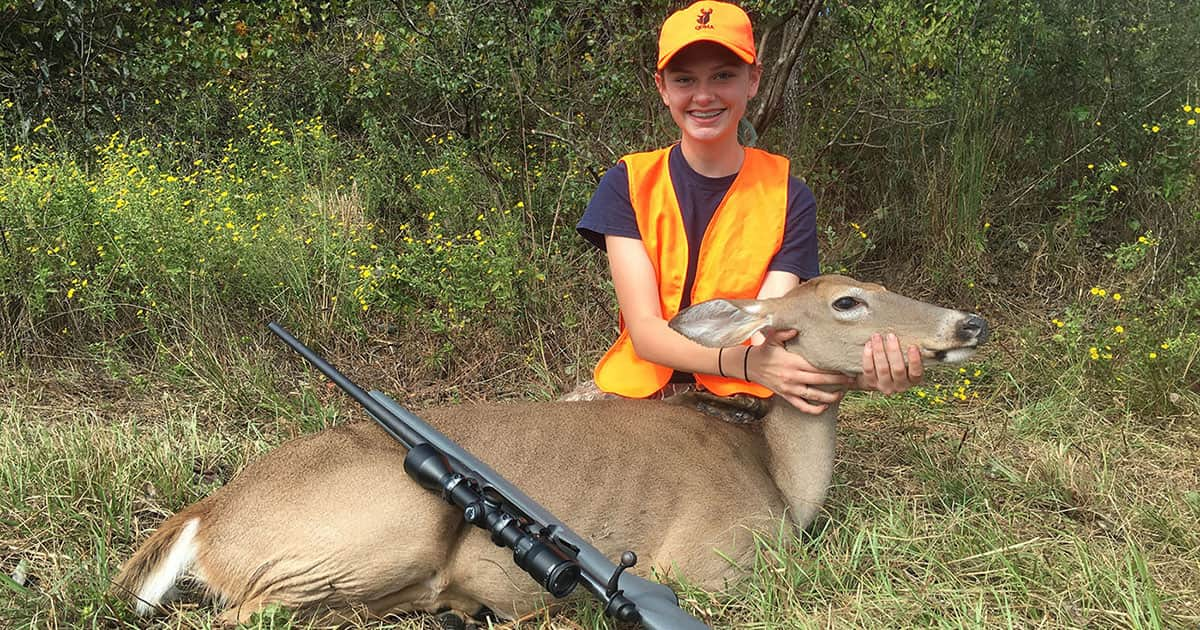 A youth deer hunter with a doe harvested in Mississippi.